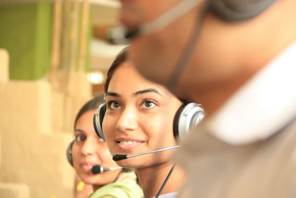Customer care agents with headsets