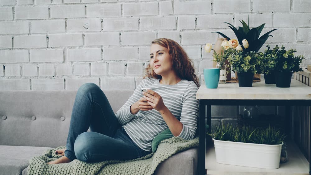 A customer relaxing at home